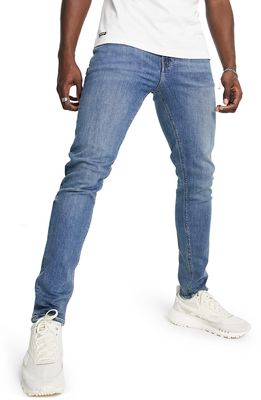 ASOS DESIGN Skinny Jeans in Mid Blue