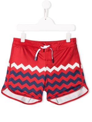 Perfect Moment Kids zigzag print board shorts - Red