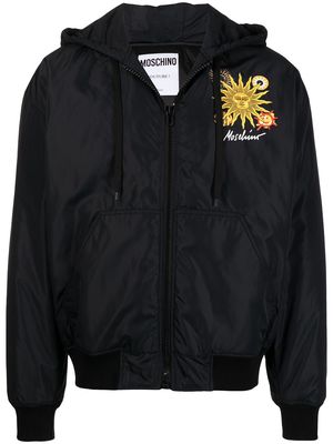 Moschino sun-print puffer jacket - Black