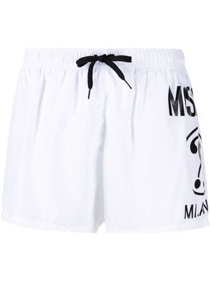Moschino logo print swim shorts - White