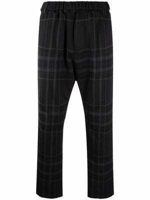 White Mountaineering check tapered trousers - Black