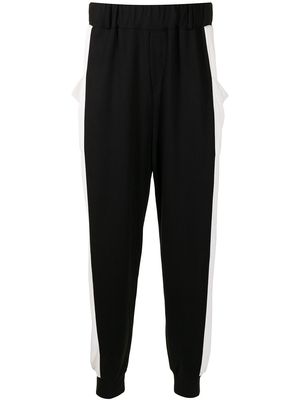 Lisa Von Tang bold side-stripe trousers - Black