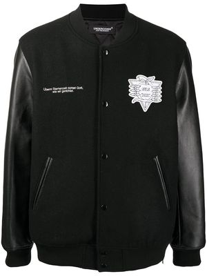 UNDERCOVER embroidered-motifs panelled bomber jacket - Black
