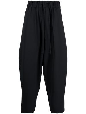 White Mountaineering Sarouel stretch-twill trousers - Black