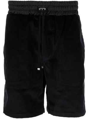 AMIRI toggle-fastening velvet-effect shorts - Black