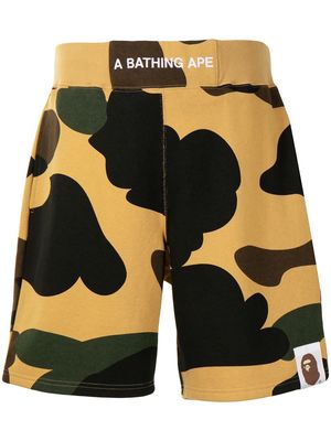 A BATHING APE® camo-print logo waistband shorts - Yellow