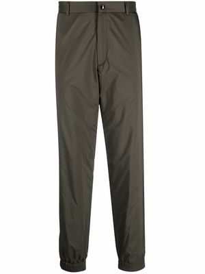 Moncler logo-tape fitted-ankles slim-cut trousers - Green