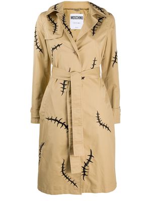 Moschino scar-print trench coat - Neutrals