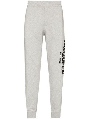 Alexander McQueen graffiti-print track pants - Grey