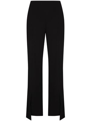 GANNI asymmetric hem high-waisted trousers - Black
