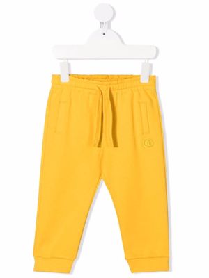 Dolce & Gabbana Kids embroidered-logo track trousers - Yellow