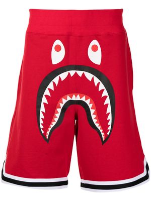 A BATHING APE® Shark graphic-print track shorts - Red
