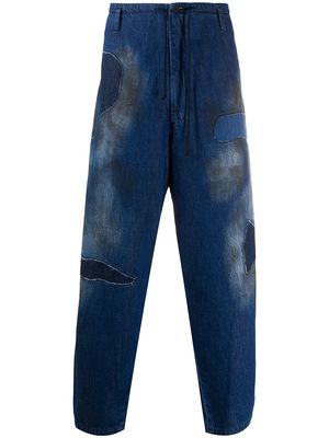 Yohji Yamamoto stained loose fit jeans - Blue