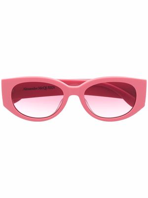 Alexander McQueen Eyewear Graffiti logo-print oval-frame sunglasses - Pink