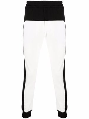 Alexander McQueen panelled cotton track pants - White