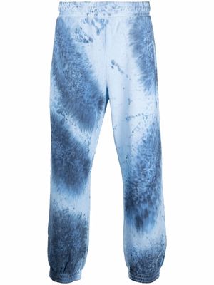 MCQ tie-dye print track pants - Blue