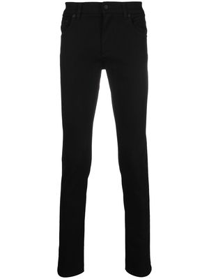 Dolce & Gabbana logo-embossed skinny jeans - Black