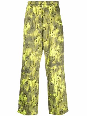 Paria Farzaneh neon-print side-zip trousers - Green
