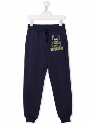 Moschino Kids embroidered-logo tapered trousers - Blue