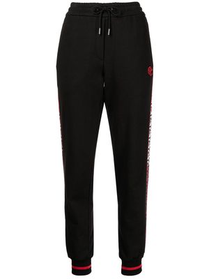 MCM geometric-monogram slim joggers - Black