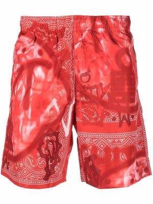 Givenchy spray-paint swim shorts - Red