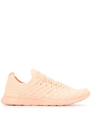 APL: ATHLETIC PROPULSION LABS TechLoom Wave knitted sneakers - Pink