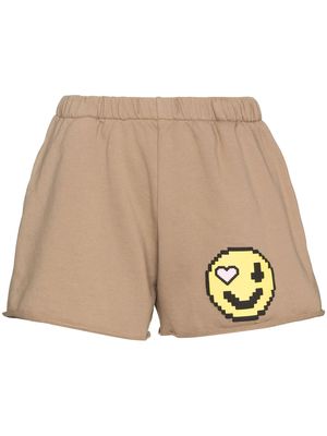 Natasha Zinko Emoji-print track shorts - Neutrals