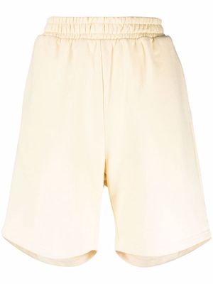 12 STOREEZ elasticated-waist cotton track shorts - Yellow