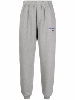 VETEMENTS embroidered-logo track pants - Grey
