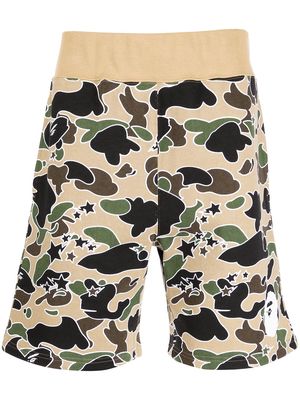 A BATHING APE® camouflage-print cotton shorts - Yellow