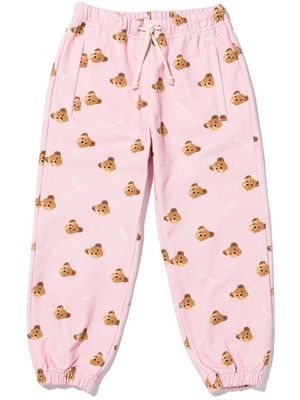 Palm Angels Kids all-over teddy bear print trousers - Pink