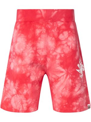 A BATHING APE® tie-dye track shorts - Red