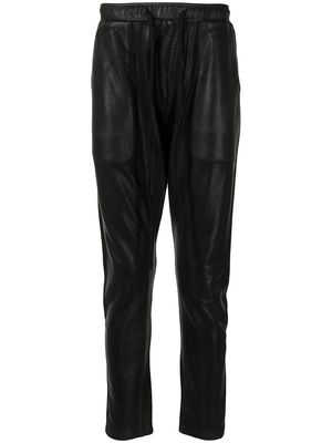 Julius coated-finish seamed trousers - Black