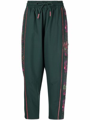 PUMA side floral print track pants - Green