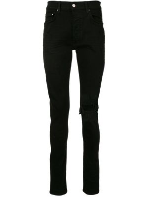 AMIRI distressed skinny jeans - Black
