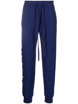 Versace tonal logo tapered track pants - Blue