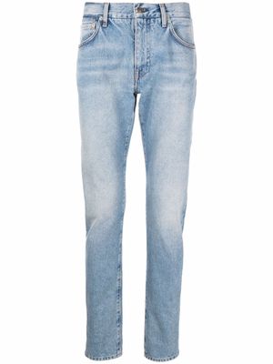 Alanui faded-finish slim-cut jeans - Blue