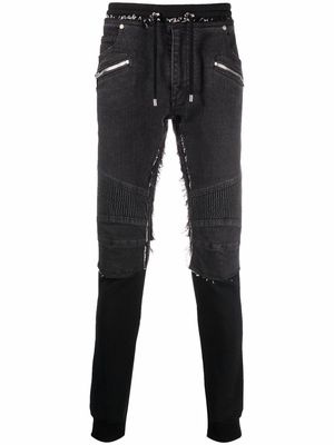 Balmain layered-effect raw-cut trousers - Black