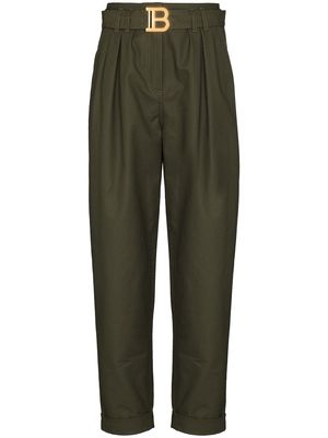 Balmain logo-buckle tapered trousers - Green