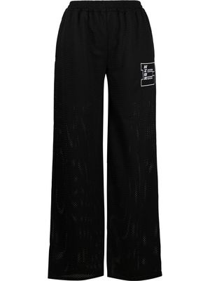 MCQ patch-detail wide-leg trousers - Black