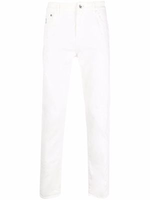 Brunello Cucinelli slim-fit logo-patch jeans - White