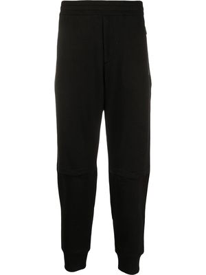 Alexander McQueen embroidered logo patch track trousers - Black