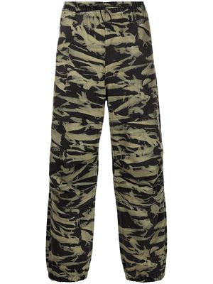 Alexander Wang camouflage-print wide leg trackpants - Black
