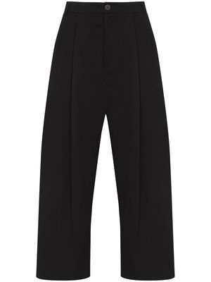 Studio Nicholson Sorte wide-leg trousers - Black