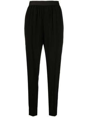 Maison Margiela elasticated waistband tapered trousers - Black