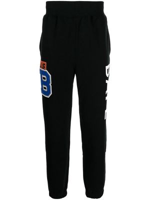 A BATHING APE® logo track trousers - Black