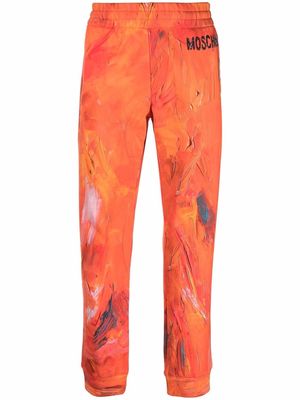 Moschino paint-effect joggers - Orange