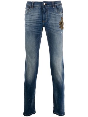 Dolce & Gabbana beaded crown slim-fit jeans - Blue
