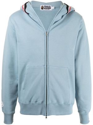 A BATHING APE® graphic-print zip-up hoodie - Blue