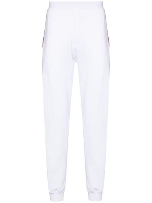 Alexander McQueen logo tape tapered track pants - White